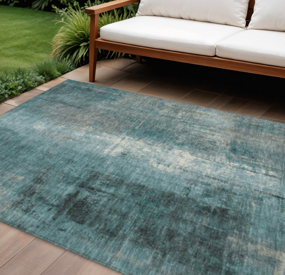 HomeRoots 5' Teal Blue and Ivory Abstract Area Rug - Durable, Washable, Indoor/Outdoor Design for Any Space 9' X 12' 628005