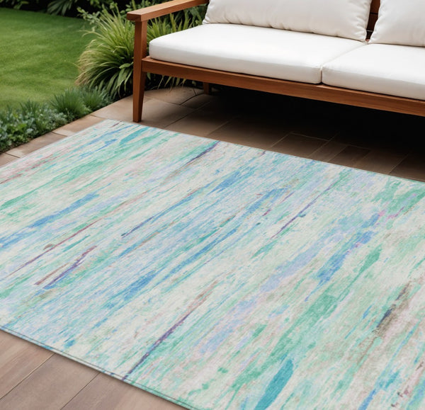 HomeRoots 5' Teal Blue and Ivory Abstract Indoor Outdoor Area Rug - Stylish, Washable, and Durable for Any Space 9' X 12' 628222