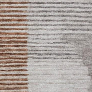 HomeRoots 5' Taupe and Rust Geometric Area Rug - Stylish, Washable Design for Indoor and Outdoor Spaces 5' X 8' 628663