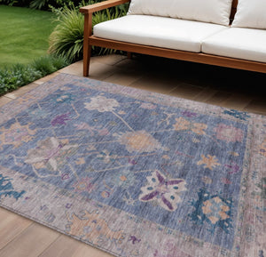 HomeRoots 9' X 12' Vibrant Blue and Purple Tribal Washable Area Rug for Indoor/Outdoor High-Traffic Spaces 629483