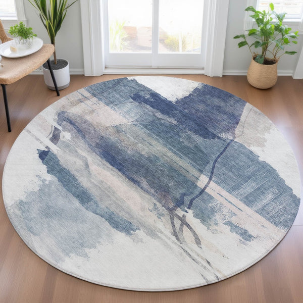 HomeRoots 8' Round Abstract Area Rug in Blue and Ivory – Stylish, Washable, Durable for Indoor & Outdoor Use 629763