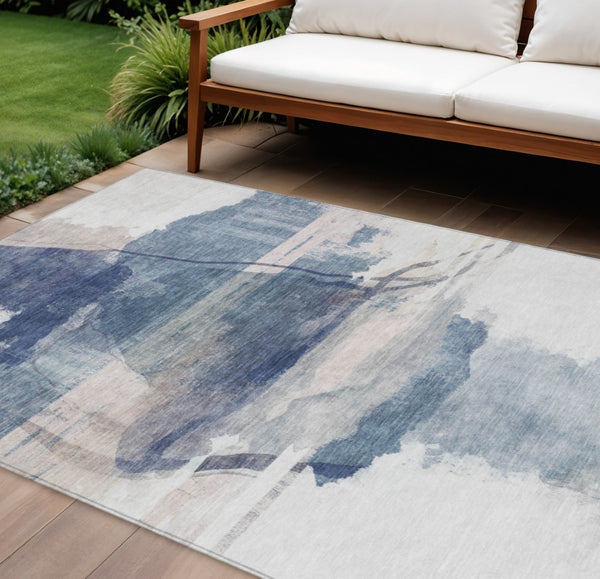 HomeRoots 10' Blue & Ivory Abstract Washable Area Rug – Stylish Indoor/Outdoor Design, Stain Resistant & Non-Slip 629766