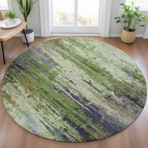 HomeRoots 8' Round Abstract Area Rug in Green, Lavender & Purple - Stylish, Washable for Indoor/Outdoor Use 629837