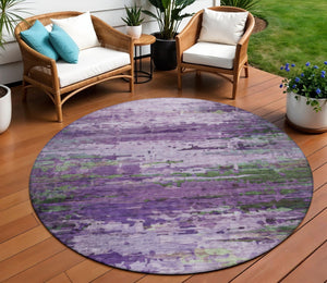 HomeRoots 8' Round Abstract Area Rug in Bold Purple, Green & Charcoal - Washable for Indoor & Outdoor Use 629849