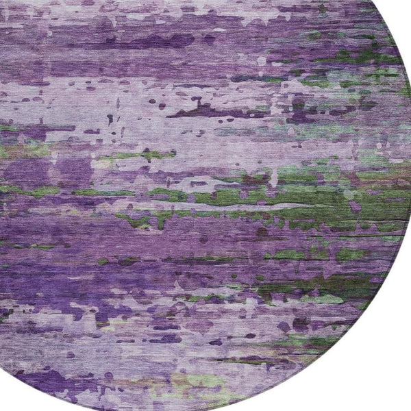 HomeRoots 8' Round Abstract Area Rug in Bold Purple, Green & Charcoal - Washable for Indoor & Outdoor Use 629849