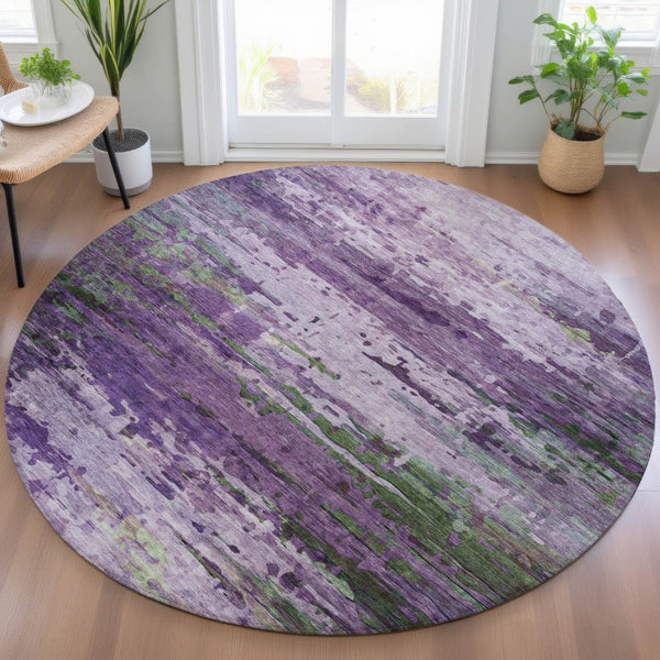 HomeRoots 8' Round Abstract Area Rug in Bold Purple, Green & Charcoal - Washable for Indoor & Outdoor Use 629849