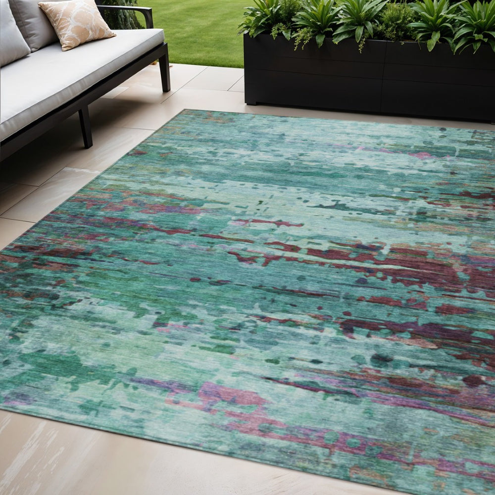HomeRoots 5' X 8' Abstract Indoor Outdoor Area Rug in Teal, Aqua & Plum - Durable & Washable for Easy Care 629860