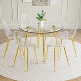 English Elm A Modern Minimalist Style Round Transparent Tempered Glass Table With Gold Metal Legs, Paired With 6 Modern Style Transparent Dining Chairs For A Luxurious Experience.