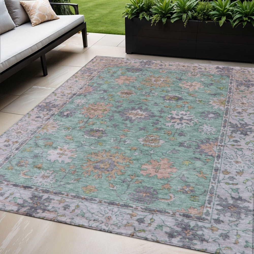 HomeRoots 5' X 8' Floral Area Rug in Mint Green, Peach & Aqua - Washable, Durable for Indoor & Outdoor Use! 630268
