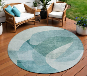 HomeRoots 5' Teal Blue and Ivory Abstract Area Rug – Washable, Stain Resistant for Indoor and Outdoor Use 8' Round 630437