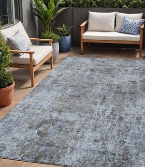 HomeRoots 5' Blue and Taupe Abstract Area Rug - Stylish, Washable, Durable Design for Indoor and Outdoor Spaces 5' X 8' 630526