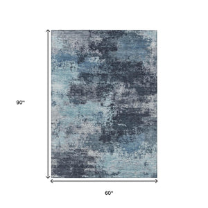 HomeRoots 5' Blue and Ivory Abstract Area Rug - Durable, Machine Washable for Indoor and Outdoor Spaces 5' X 8' 630640