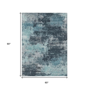 HomeRoots 5' Vibrant Teal and Navy Abstract Area Rug – Durable, Washable, Ideal for Indoor and Outdoor Spaces 5' X 8' 630658
