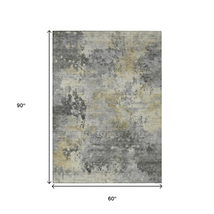 HomeRoots 5' Modern Abstract Pewter Charcoal and Gold Washable Area Rug for Indoor and Outdoor Spaces 5' X 8' 630880