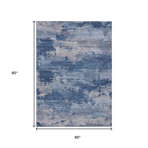 HomeRoots 5' Navy Blue and Ivory Abstract Area Rug - Durable, Washable Design for Indoor and Outdoor Spaces 5' X 8' 630928