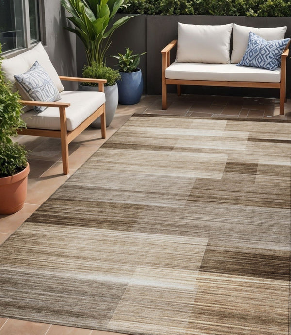 HomeRoots 5' Durable Brown and Ivory Striped Area Rug for Indoor or Outdoor Spaces - Stylish, Washable Design 5' X 8' 630976