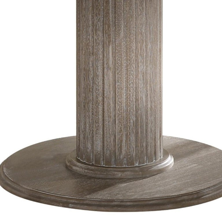 HomeRoots 47 Inch Round Gray Wood Dining Table with Sculptural Pedestal Base for Modern Homes 631270