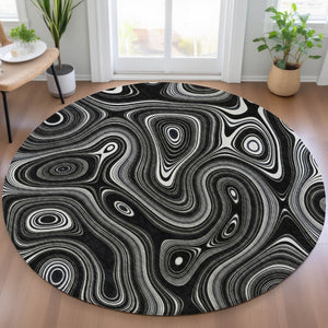HomeRoots 5' Modern Black and Ivory Geometric Washable Area Rug for Indoor and Outdoor High-Traffic Spaces 8' Round 631373