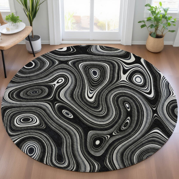 HomeRoots 5' Modern Black and Ivory Geometric Washable Area Rug for Indoor and Outdoor High-Traffic Spaces 8' Round 631373