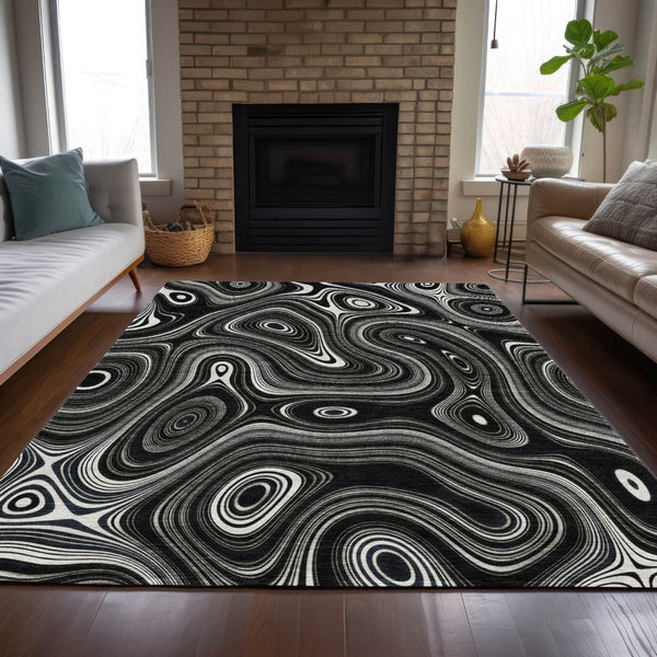 HomeRoots 5' Modern Black and Ivory Geometric Washable Area Rug for Indoor and Outdoor High-Traffic Spaces 8' X 10' 631374