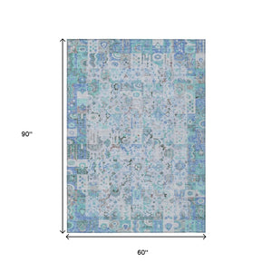 HomeRoots 5' Blue and Silver Patchwork Area Rug - Washable, Stain-Resistant Design for Indoor and Outdoor Use 5' X 8' 631420