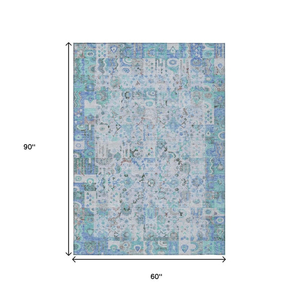 HomeRoots 5' Blue and Silver Patchwork Area Rug - Washable, Stain-Resistant Design for Indoor and Outdoor Use 5' X 8' 631420