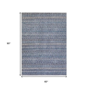 HomeRoots 5' Stylish Blue and Sky Blue Striped Washable Area Rug for Indoor and Outdoor High-Traffic Spaces 5' X 8' 631666