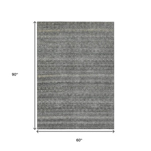 HomeRoots 5' Stylish Pewter and Gray Striped Washable Area Rug for Indoor and Outdoor Spaces - Durable Design 5' X 8' 631690