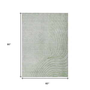 HomeRoots 5' Abstract Artichoke Green and Silver Washable Area Rug for Indoor and Outdoor Durability 5' X 8' 631738