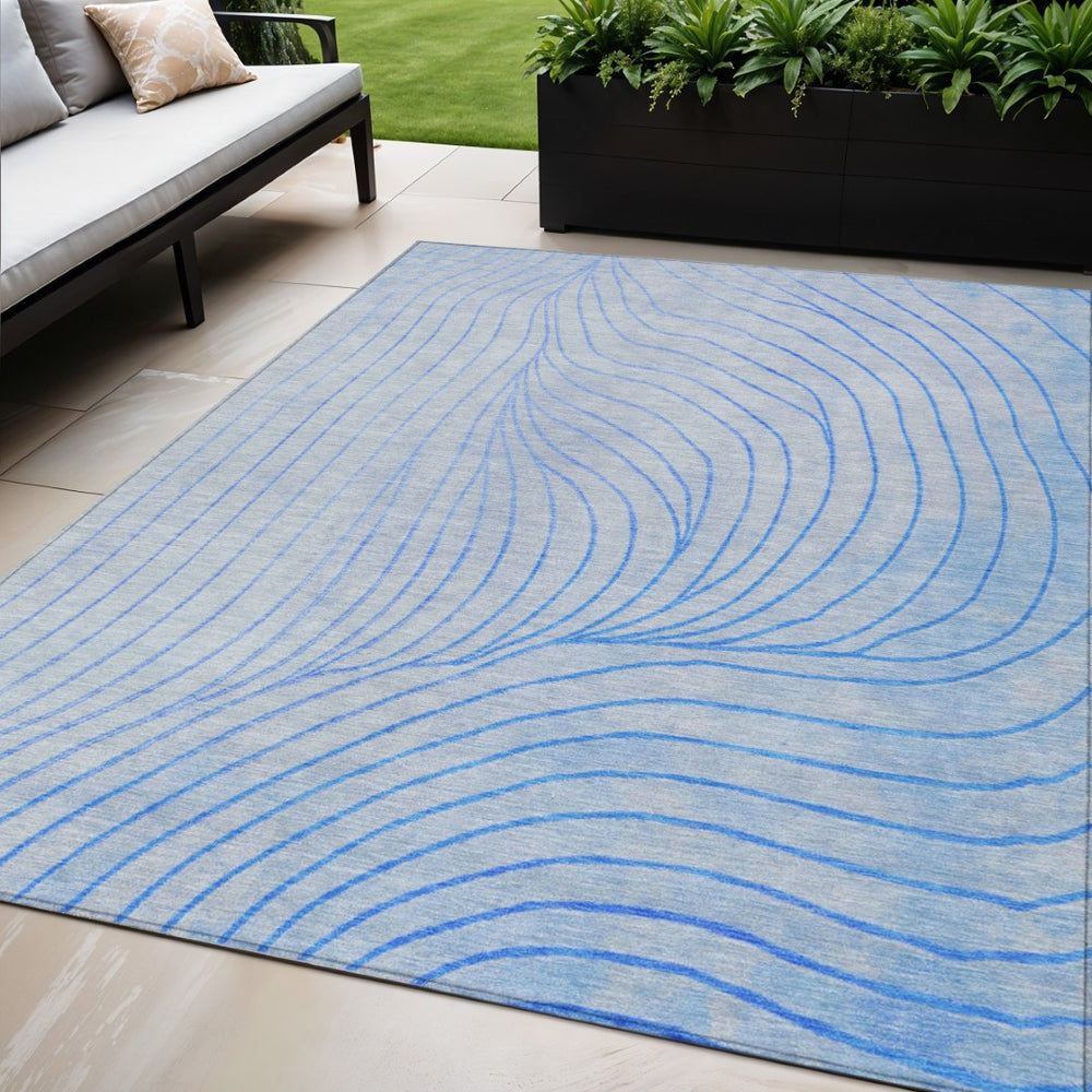 HomeRoots 5' Blue And Silver Abstract Area Rug - Washable, Weather-Resistant, Modern Design for Indoors & Outdoors 5' X 8' 631756