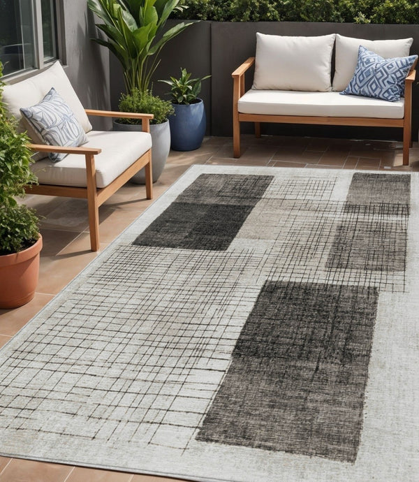HomeRoots 5' Modern Ivory and Black Geometric Area Rug - Washable, Durable, Indoor/Outdoor, Stylish Accent 5' X 8' 631934