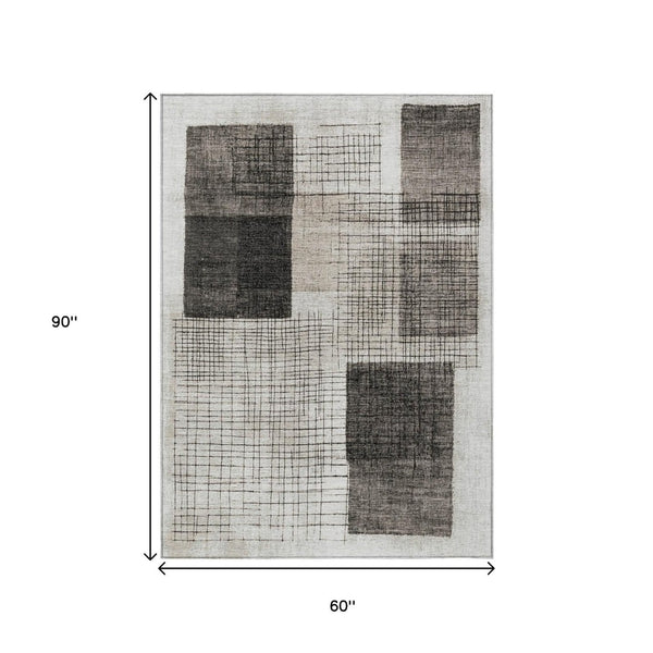 HomeRoots 5' Modern Ivory and Black Geometric Area Rug - Washable, Durable, Indoor/Outdoor, Stylish Accent 5' X 8' 631934