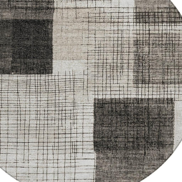 HomeRoots 5' Modern Ivory and Black Geometric Area Rug - Washable, Durable, Indoor/Outdoor, Stylish Accent 8' Round 631935