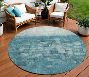 HomeRoots 8' Teal Blue and Silver Round Abstract Area Rug - Stylish, Washable, Indoor/Outdoor Accent for Any Space 632097