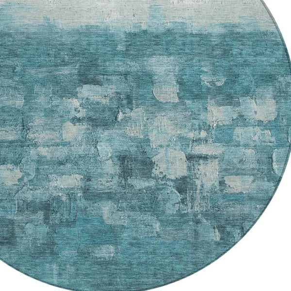 HomeRoots 8' Teal Blue and Silver Round Abstract Area Rug - Stylish, Washable, Indoor/Outdoor Accent for Any Space 632097