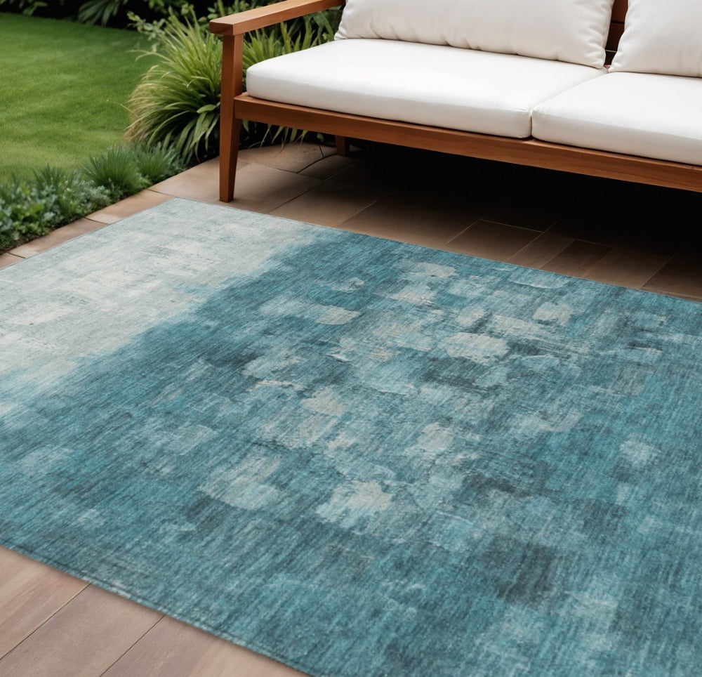 HomeRoots 5' Teal Blue and Silver Abstract Washable Area Rug for Stylish Indoor and Outdoor Spaces 10' X 14' 632100