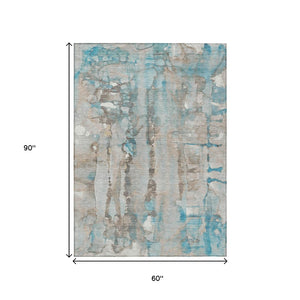 HomeRoots 5' X 8' Teal Blue and Ivory Abstract Rug - Durable, Washable, Stylish Indoor/Outdoor Floor Covering 632144