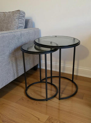 HomeRoots Set of Two Modern Clear Glass and Gunmetal Iron Nested Tables for Stylish Living Spaces 632713