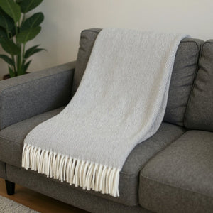 HomeRoots 55" Lightweight Woven Herringbone Throw Blanket in Light Gray & White with Fringe for Cozy Style! 633086