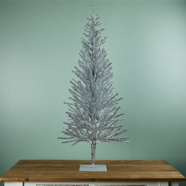 HomeRoots 4' Silver Tinsel Sparse Pine Christmas Tree - Modern Holiday Accent for Tabletop or Small Spaces 633717