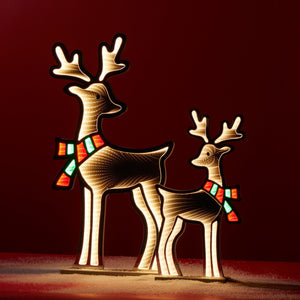 HomeRoots 33" White and Green Acrylic Deer Tabletop Sign with LED Lighting for Festive Holiday Ambiance 633782
