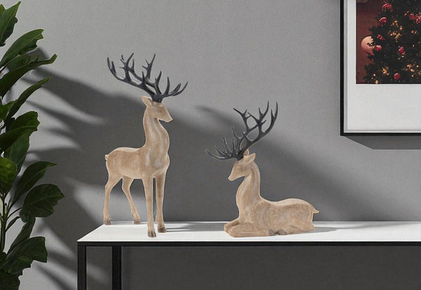 HomeRoots Set of Two Rustic Brown and Black Polyresin Deer Figurines - Woodland Decor for Home Elegance 633827