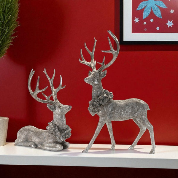 HomeRoots Set of Two Silver and Black Polyresin Deer Figurines for Elegant Holiday Décor and Gift Giving 633876