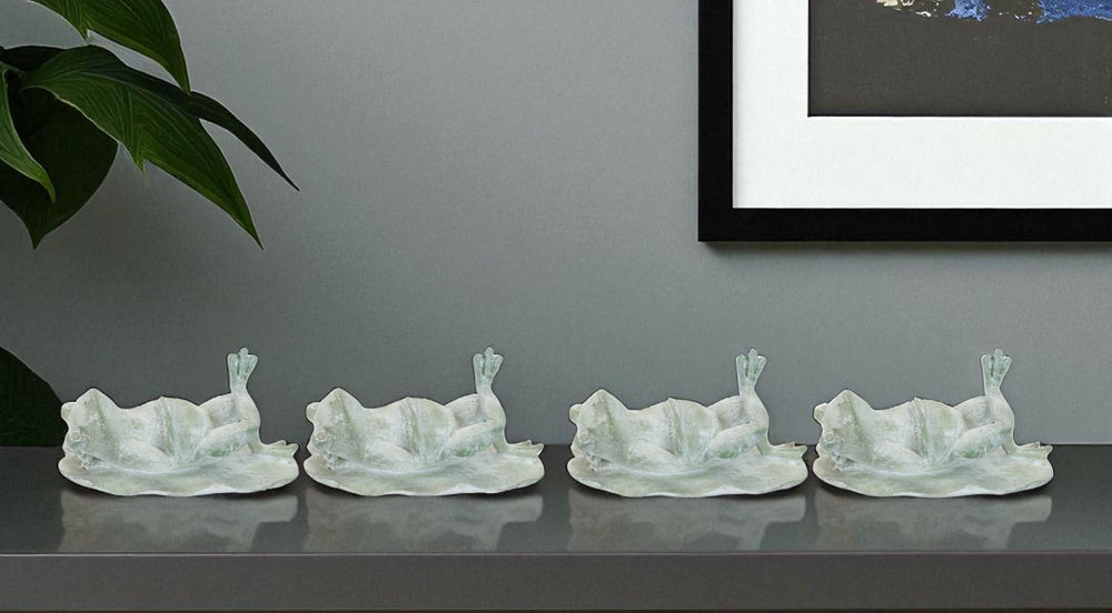 HomeRoots Set of Four Charming Green Polyresin Frog Figurines for Whimsical Home Decor and Gifting Ideas 633957