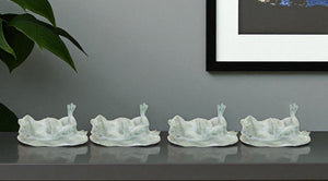 HomeRoots Set of Four Charming Green Polyresin Frog Figurines for Whimsical Home Decor and Gifting Ideas 633957