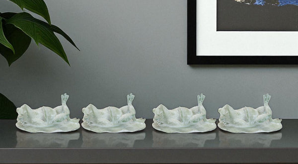 HomeRoots Set of Four Charming Green Polyresin Frog Figurines for Whimsical Home Decor and Gifting Ideas 633957