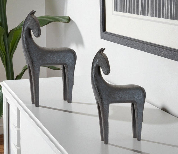 HomeRoots Set of Two Elegant Black Polyresin Horse Sculptures for Stylish Home & Office Décor Accents 633978