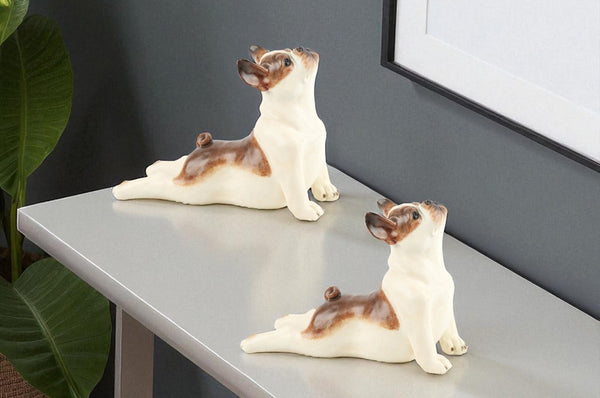 HomeRoots Set of Two Charming White and Brown Polyresin Dog Sculptures for Stylish Home Decor Accents 633979