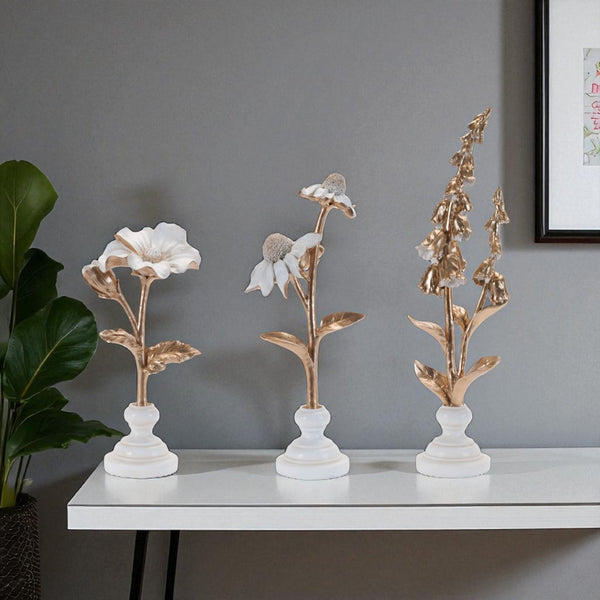 HomeRoots Set of Three Elegant Gold and White Ceramic Sculptures for Modern Home Décor and Gift Giving 634141