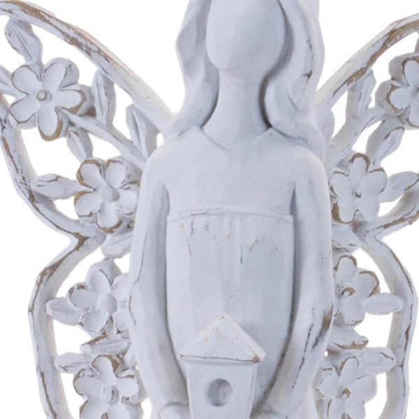 HomeRoots Set of Four White Polyresin Angel Figurines with Floral Wings for Home Decor & Thoughtful Gifts 634142